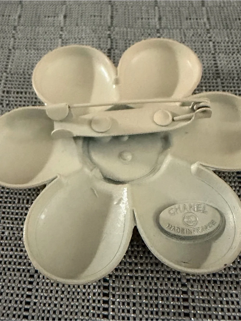 Chanel Flower Brooch in Cream with Black & Gold Logo